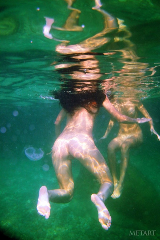 Swimming with two beautiful babes