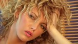 Jicy babe having curly white hair is enjoying passionate solo in front of camera. She is touching her small tits and great ass to feel great pleasure.