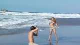 Watch how a stunning blonde reveals her perfect boobies and perfectly shaved pussy in a first class photoshoot with a beautiful ocean sight.