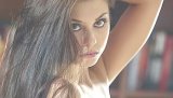 Striking babe disrobes her beautiful inner clothes exposing her erect nipples and moist cock deprived pussy with flowery lips &amp; smooth clitoris.