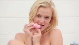 Horny babe having white hair is taking off her purple lingerie on camera. She is also feeling great penetrating her twat with this sex toy.