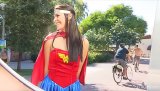 Wonderful brunette cosplays as everyone's DC favorite - watch Wonder Woman prance around outdoors, flash her tiny tits and so forth.
