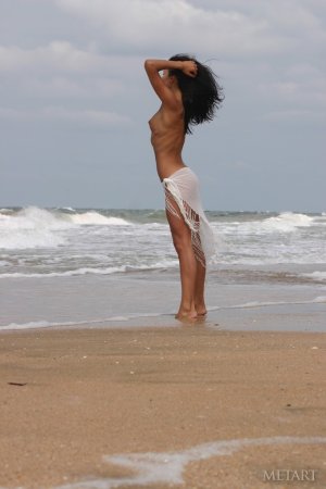 Amazingly fit girl in the ocean water photo 4