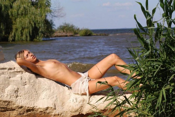 Nice cutie posing nude outdoor photo 5
