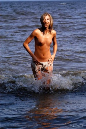 Nice cutie posing nude outdoor photo 6