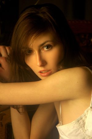 Tight beauty taking off her white shirt photo 5
