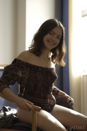 Wonderful cutie is undressing herself photo 11