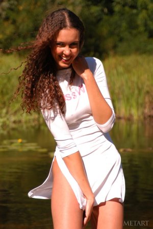 Outdoor posing with a slender brunette photo 9