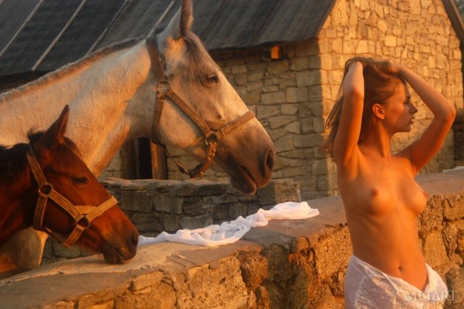 Half-naked chick spends time with a stallion. photo 14