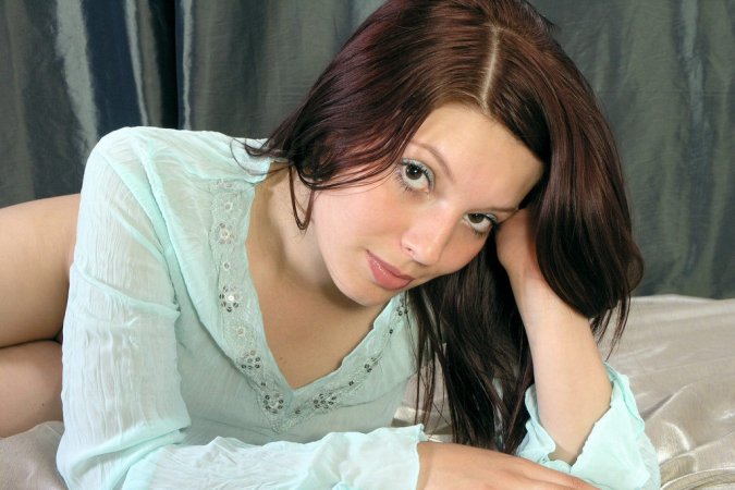 Teen brunette shows her amazing long legs photo 7