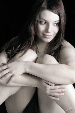 Teen brunette shows her amazing long legs photo 16