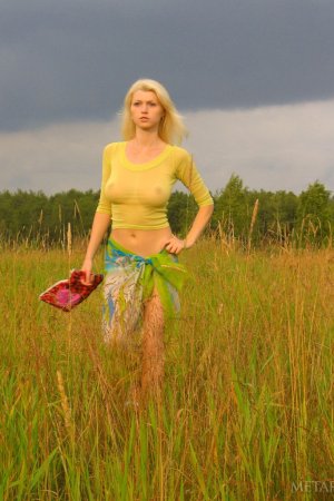 Nude posing in the wild fields photo 6