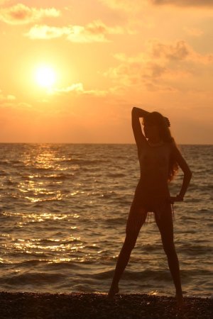 Beach posing scene with a sexy blondie photo 1