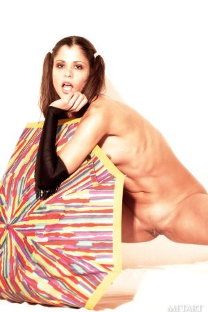 Svelte playful girl having fun with colorful umbrella photo 16