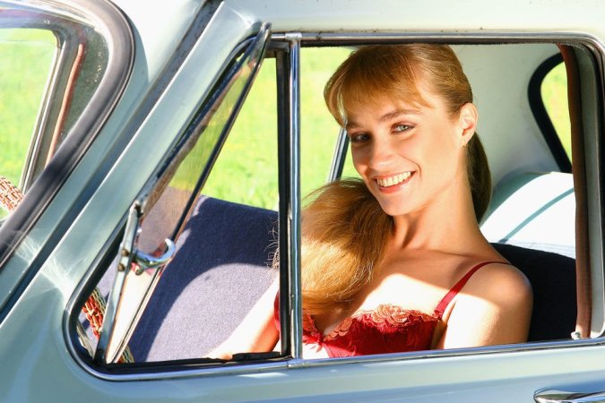 Super sweet cutie undressing at her car photo 3