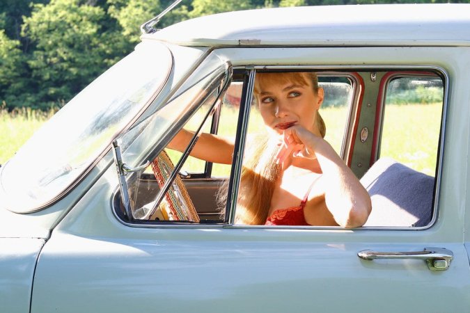 Super sweet cutie undressing at her car photo 9
