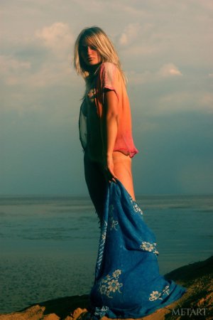 Beach posing with a stunning blonde photo 9