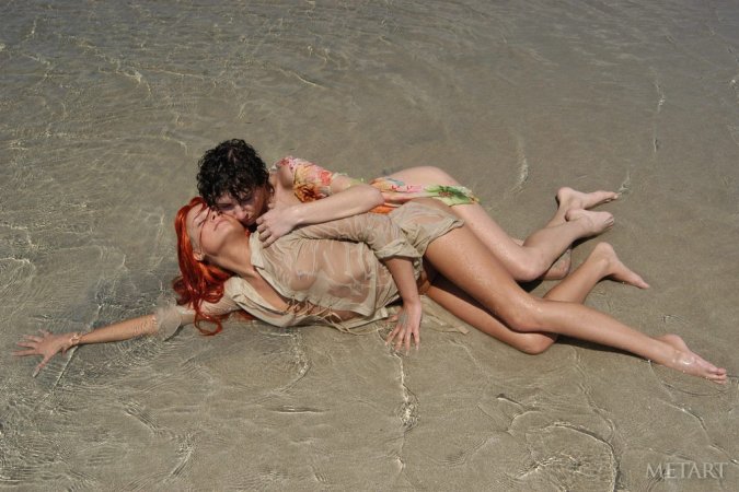 Tight lesbies playing in the water photo 1