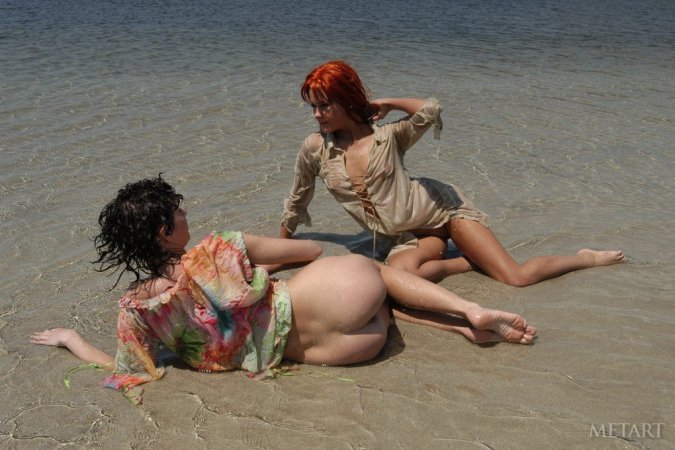 Tight lesbies playing in the water photo 10