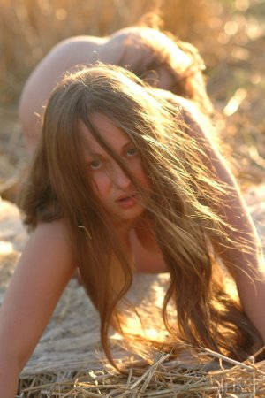 Playful babe dances in the haystack photo 6