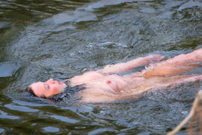 Fantastic outdoor posing from a brunette babe photo 9