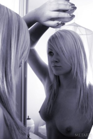 Blonde babe posing in the mirror photo 13