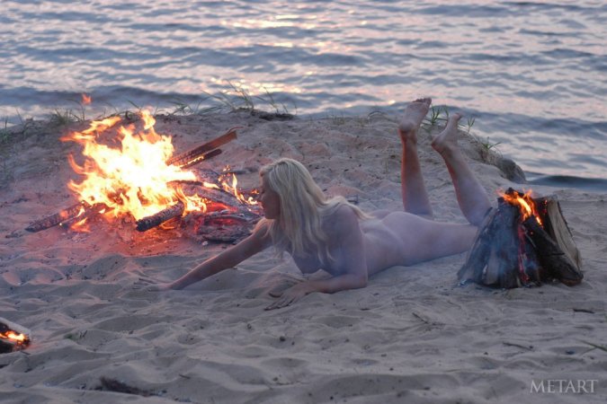 Slender lesbians having fun on a beach photo 8