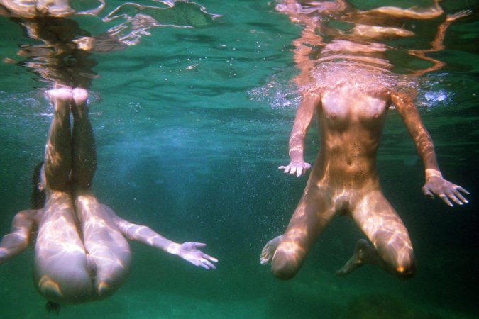 Swimming with two beautiful babes photo 7
