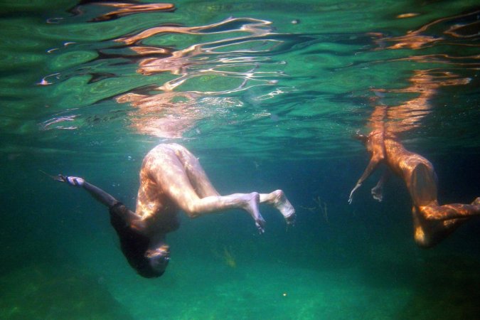 Swimming with two beautiful babes photo 8