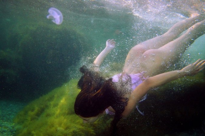 Swimming with two beautiful babes photo 9