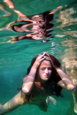 Swimming with two beautiful babes photo 12