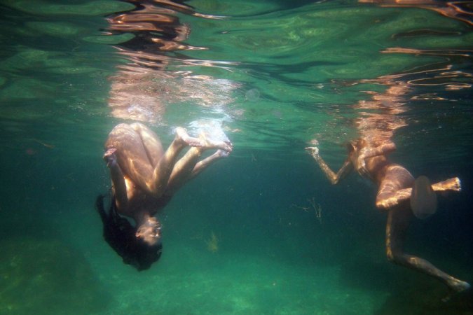 Swimming with two beautiful babes photo 14