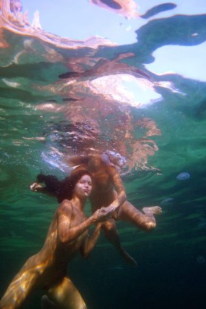 Swimming with two beautiful babes photo 15