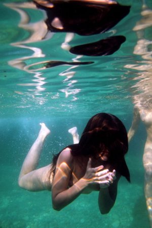 Swimming with two beautiful babes photo 16