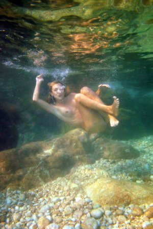 Swimming with two beautiful babes photo 18