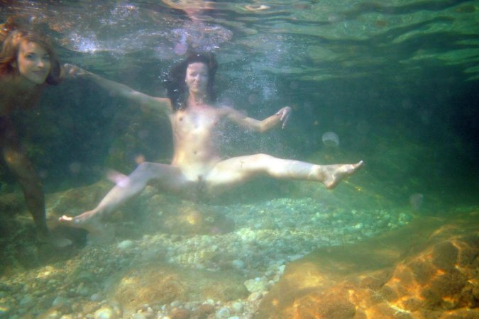 Swimming with two beautiful babes photo 20