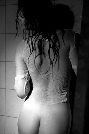 Black haired young model under the shower photo 4