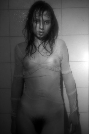 Black haired young model under the shower photo 5