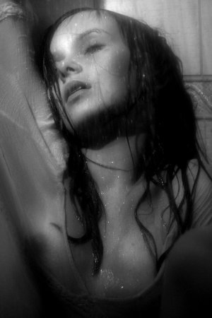Black haired young model under the shower photo 18