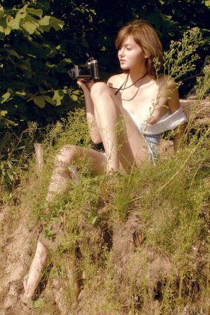 Two cuties filming each other outdoor photo 7