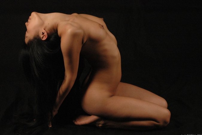 Sexy Asian in a passionate posing scene photo 2
