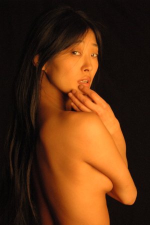 Sexy Asian in a passionate posing scene photo 8