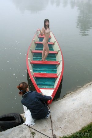 Slim Asian shows off her tight buns photo 1