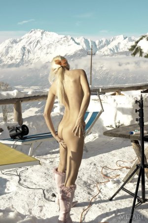 Winter posing session features a sexy blonde photo 3