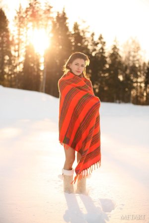 Pretty teenage girl playing on beach sand while naked photo 11