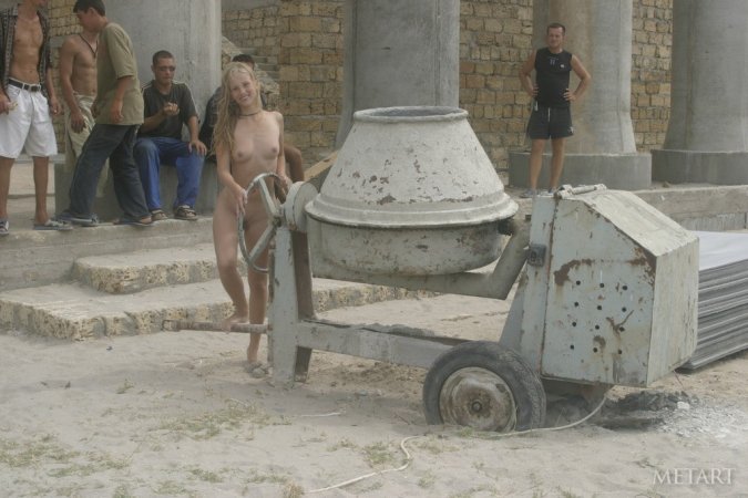Hot girl gets naked on an ordinary beach photo 1