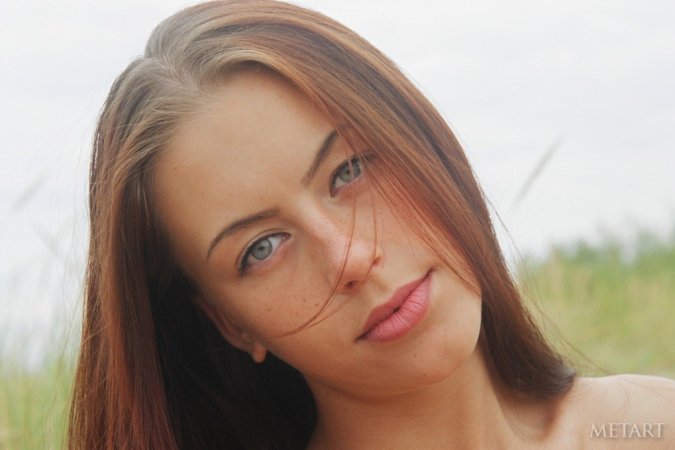 Brunette angel posing on the beach photo 9