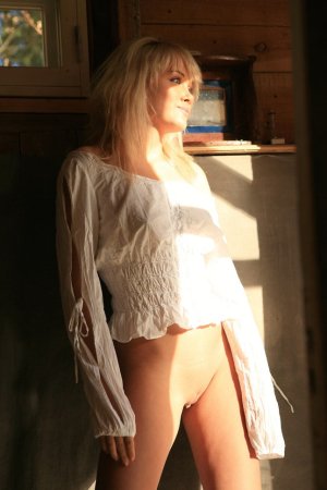 Blonde with puffy nipples is posing photo 16