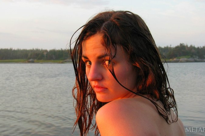 Getting close to the nature while nude photo 1
