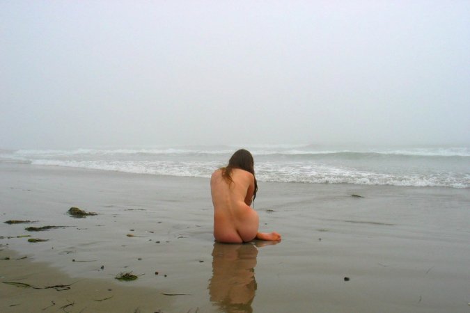 Getting close to the nature while nude photo 3